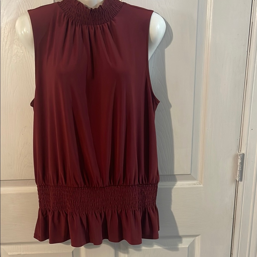 White House Black Market Sleeveless Smocked Waist Peplum Blouse in Burgundy